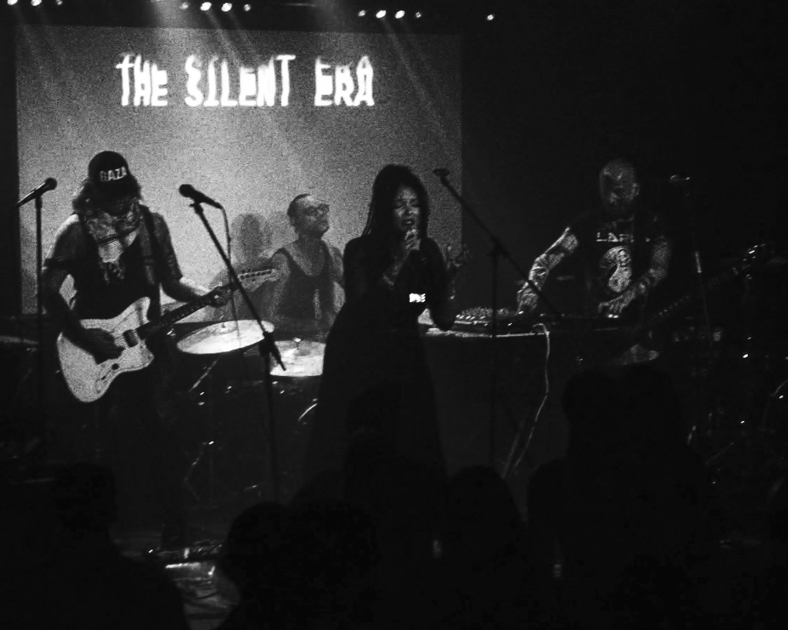The Silent Era live at The Lexington, London, with the crowd in silhouette